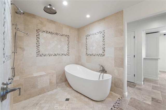72408 Desert Dr, Rancho Mirage, CA 92270 - bathroom featuring tile walls, a freestanding bath, a tile shower, and recessed lighting