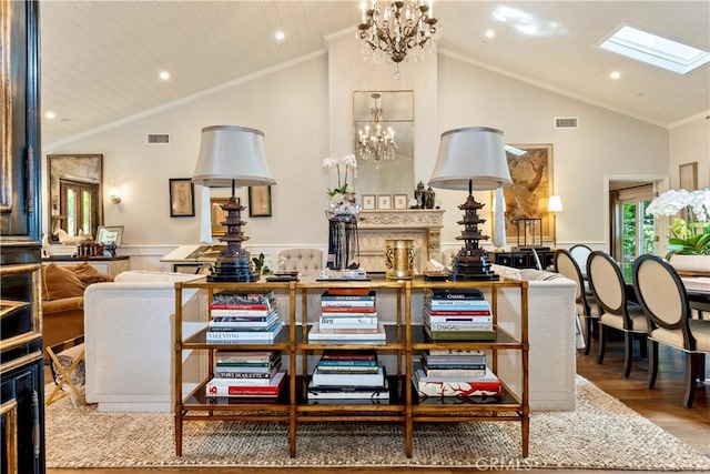 302 W Carter Ave, Sierra Madre, CA 91024 - interior space with wainscoting, wood finished floors, a chandelier, recessed lighting, and high vaulted ceiling