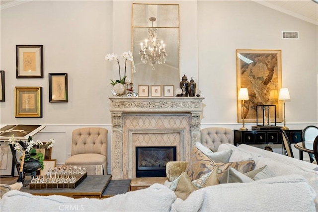 302 W Carter Ave, Sierra Madre, CA 91024 - living room with a chandelier, crown molding, a decorative wall, lofted ceiling, and a wainscoted wall