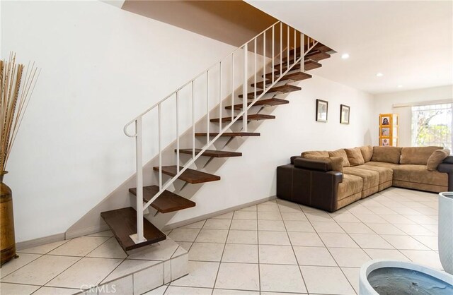 900 E Sagebank St, Carson, CA 90746 - stairway with baseboards, recessed lighting, and tile patterned flooring