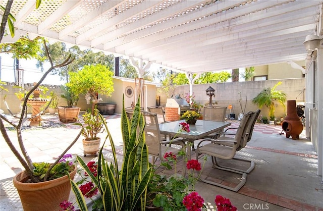 900 E Sagebank St, Carson, CA 90746 - fenced backyard with outdoor dining space, a patio area, and a grill