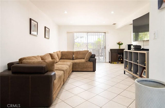 900 E Sagebank St, Carson, CA 90746 - living room with light tile patterned floors, plenty of natural light, and recessed lighting