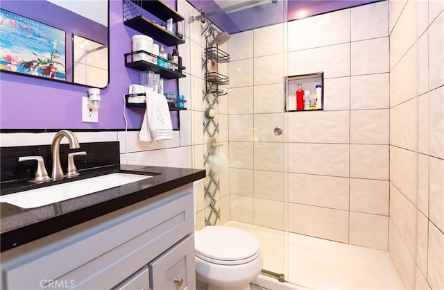 900 E Sagebank St, Carson, CA 90746 - full bathroom with toilet, a tile shower, and vanity