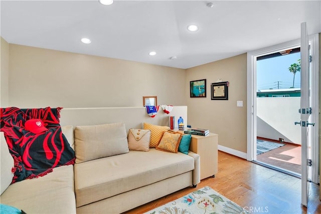 724 S Broadway Unit B, Redondo Beach, CA 90277 - living area with wood finished floors, baseboards, and recessed lighting
