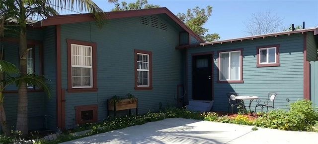 3513 Denker Ave, Los Angeles, CA 90018 - back of house with a patio and entry steps