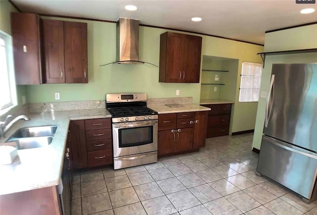 3513 Denker Ave, Los Angeles, CA 90018 - kitchen with appliances with stainless steel finishes, wall chimney range hood, a sink, recessed lighting, and light tile patterned floors