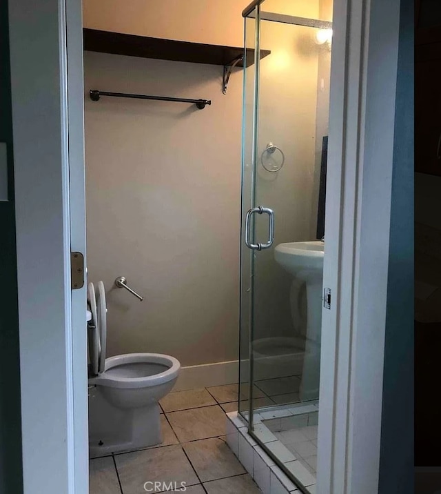 3513 Denker Ave, Los Angeles, CA 90018 - full bath featuring tile patterned flooring, a shower stall, and toilet