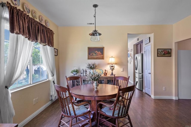 31081 Bunker Dr, Temecula, CA 92591 - dining space with dark wood-style flooring and baseboards