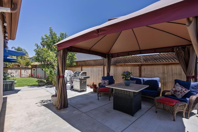 31081 Bunker Dr, Temecula, CA 92591 - fenced backyard featuring a gazebo, an outdoor hangout area, a grill, and a patio