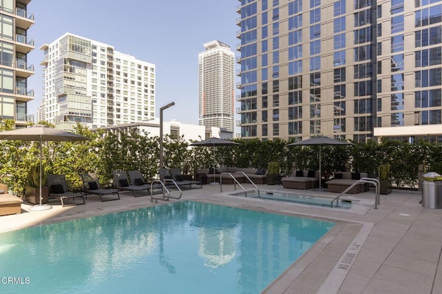 1155 S Grand Ave Unit 1403, Los Angeles, CA 90015 - community pool featuring a patio area and a view of city