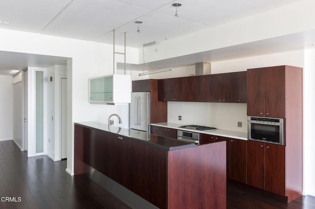 1155 S Grand Ave Unit 1403, Los Angeles, CA 90015 - kitchen with stainless steel appliances, dark wood-style floors, modern cabinets, and baseboards