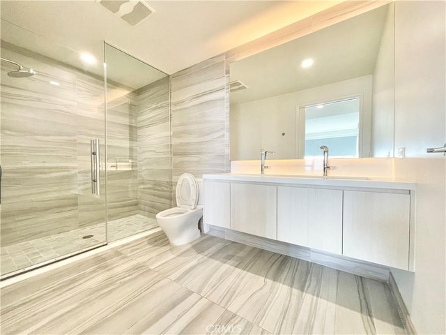 1050 S Grand Ave Unit 2003, Los Angeles, CA 90015 - full bath with toilet, double vanity, a shower stall, and recessed lighting