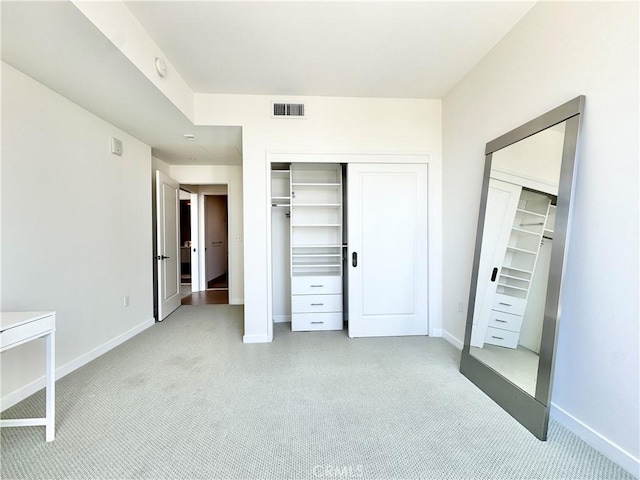 1050 S Grand Ave Unit 2003, Los Angeles, CA 90015 - unfurnished bedroom with baseboards and light colored carpet