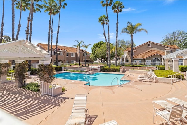68 Via Terrano, Rancho Santa Margarita, CA 92688 - community pool with a patio area, a pergola, and a residential view