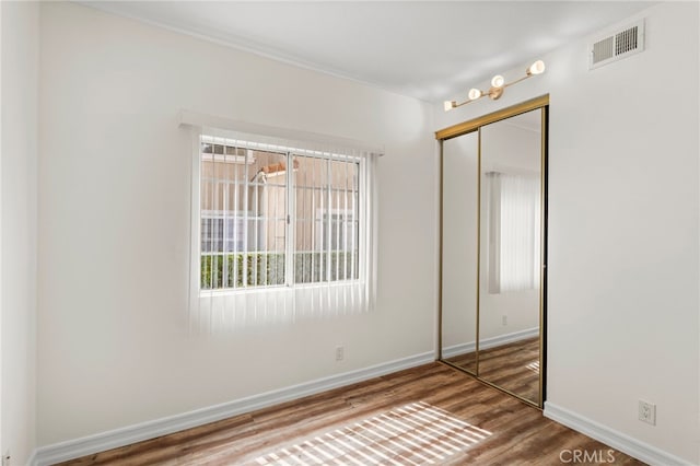 68 Via Terrano, Rancho Santa Margarita, CA 92688 - unfurnished bedroom with a closet, wood finished floors, and baseboards
