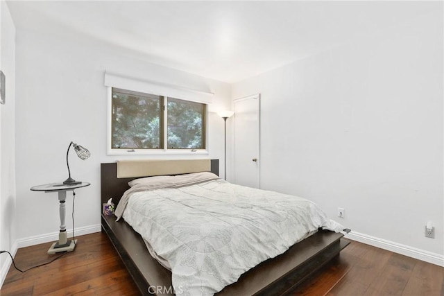 749 Canyon Crest Dr, Sierra Madre, CA 91024 - bedroom with wood-type flooring and baseboards