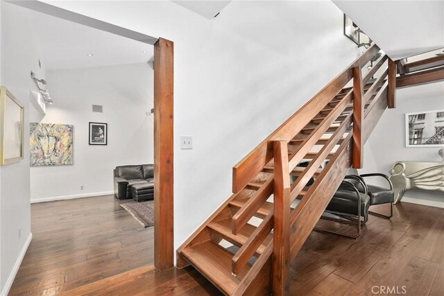 749 Canyon Crest Dr, Sierra Madre, CA 91024 - stairway with hardwood / wood-style floors and baseboards