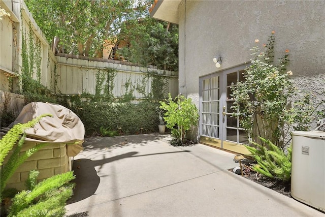 749 Canyon Crest Dr, Sierra Madre, CA 91024 - fenced backyard with a patio and french doors