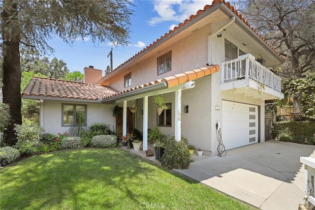 749 Canyon Crest Dr, Sierra Madre, CA 91024 - view of front of property featuring a tile roof, a balcony, stucco siding, a front lawn, and a chimney
