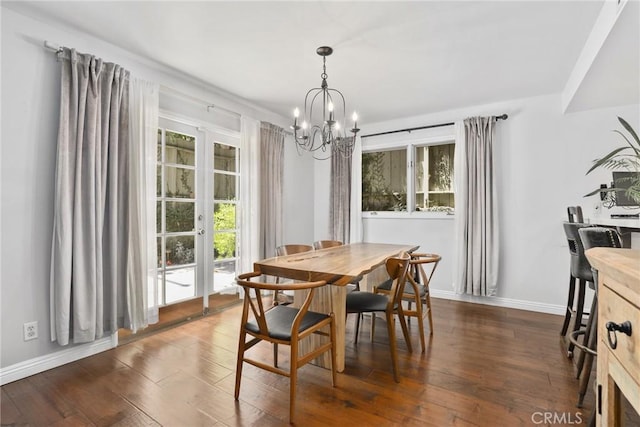 749 Canyon Crest Dr, Sierra Madre, CA 91024 - dining area featuring healthy amount of natural light, a chandelier, and dark wood-style floors