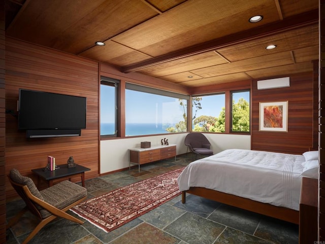 7226 Romero Dr, La Jolla, CA 92037 - bedroom with stone tile floors, wooden ceiling, wood walls, recessed lighting, and baseboards