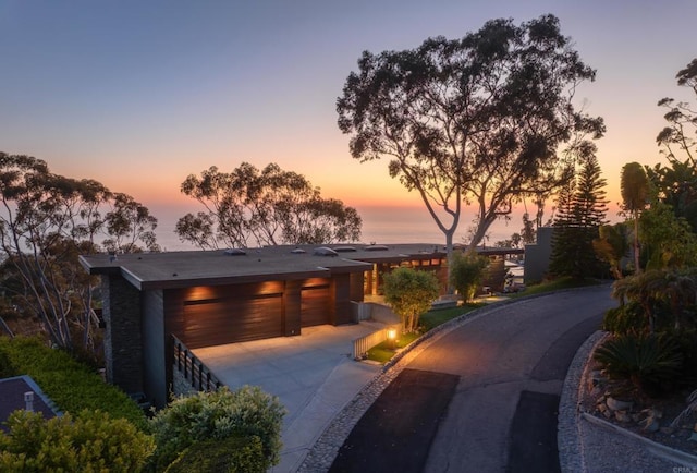 7226 Romero Dr, La Jolla, CA 92037 - view of front of property featuring driveway and a garage