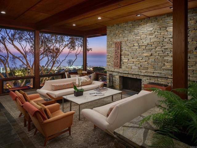 7226 Romero Dr, La Jolla, CA 92037 - view of patio featuring an outdoor living space with a fireplace and a water view
