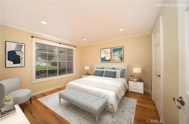 155 Oxford Unit 37, Irvine, CA 92612 - bedroom with crown molding, baseboards, wood finished floors, and recessed lighting