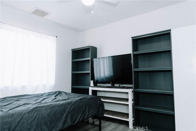 134 N American St, Ridgecrest, CA 93555 - bedroom featuring wood finished floors and a ceiling fan