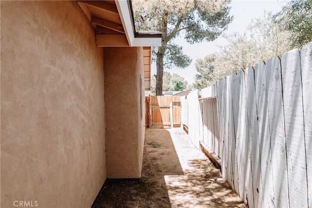 134 N American St, Ridgecrest, CA 93555 - view of side of home featuring stucco siding