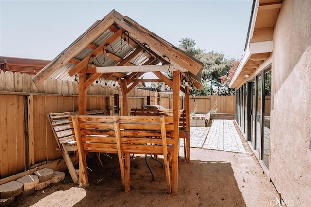 134 N American St, Ridgecrest, CA 93555 - fenced backyard featuring a gazebo and a patio area