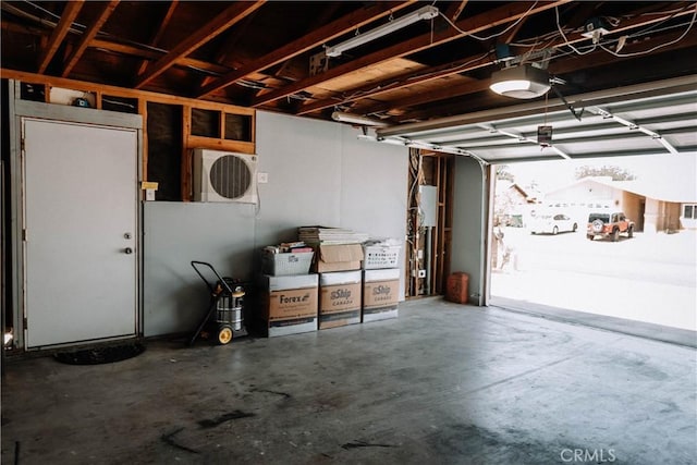 134 N American St, Ridgecrest, CA 93555 - garage with a garage door opener and a cooling unit