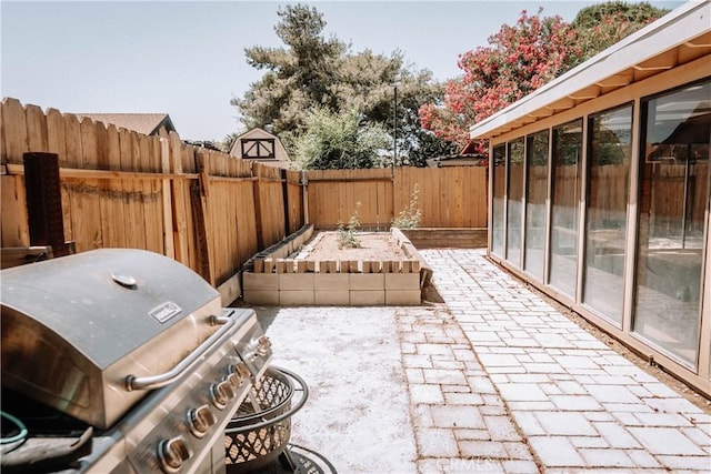 134 N American St, Ridgecrest, CA 93555 - fenced backyard featuring area for grilling and a patio area