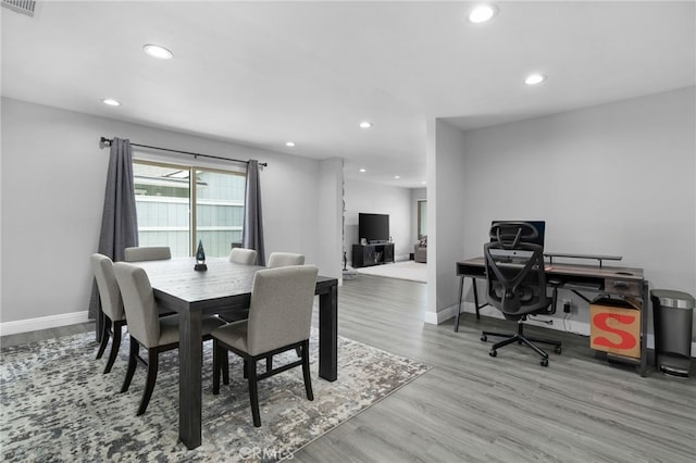 4622 San Jose St Unit W, Montclair, CA 91763 - dining area with recessed lighting, wood finished floors, and baseboards