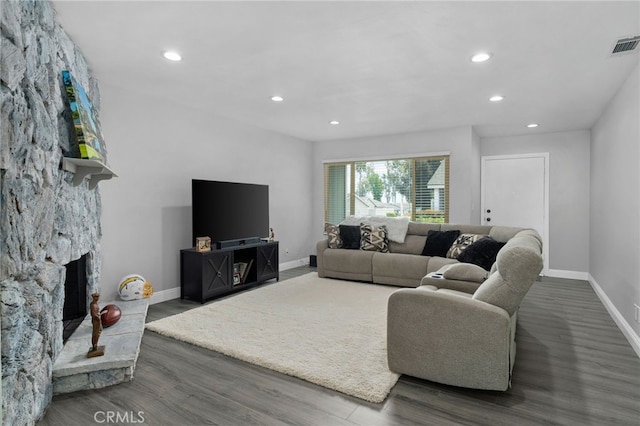 4622 San Jose St Unit W, Montclair, CA 91763 - living area with baseboards, wood finished floors, recessed lighting, and a fireplace