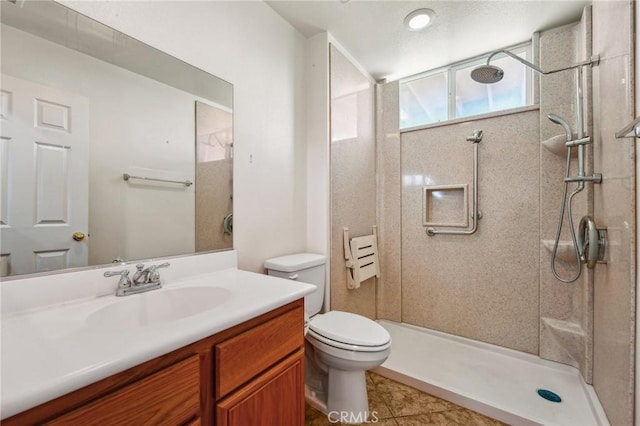 16443 Pine Forest St, Fontana, CA 92336 - bathroom with toilet, walk in shower, vanity, and tile patterned flooring