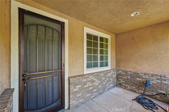 16443 Pine Forest St, Fontana, CA 92336 - property entrance featuring stucco siding and brick siding