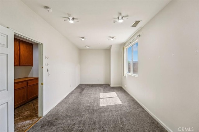 16443 Pine Forest St, Fontana, CA 92336 - spare room with carpet, a smoke detector, baseboards, and ceiling fan