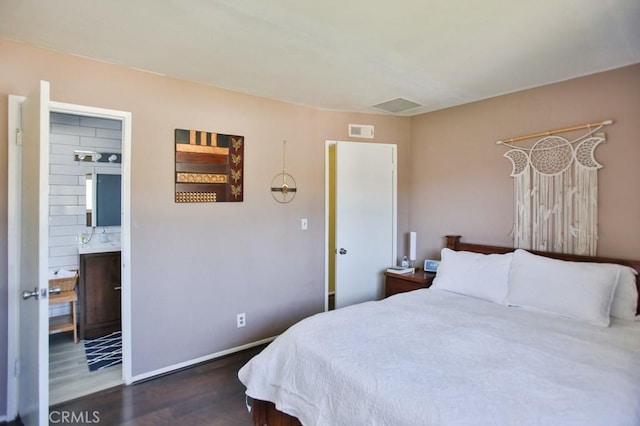 4502 Bates Dr, Yorba Linda, CA 92886 - bedroom with dark wood-style floors, baseboards, and connected bathroom