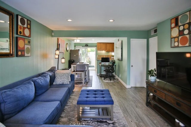4502 Bates Dr, Yorba Linda, CA 92886 - living room featuring wood finished floors, a desk, and recessed lighting