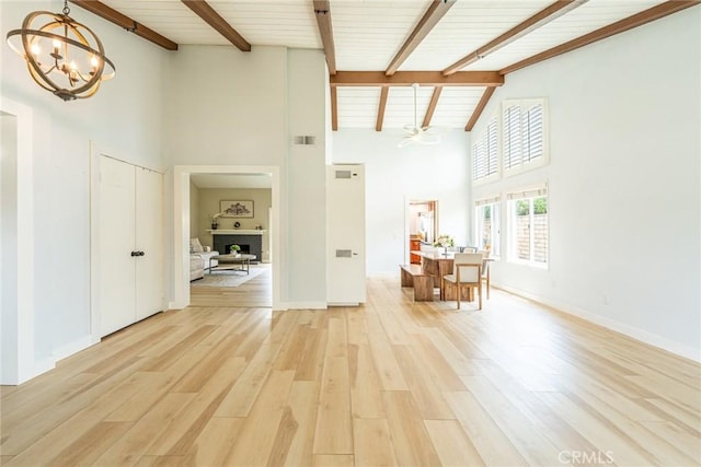 5940 Avenida Antigua, Yorba Linda, CA 92887 - living area with high vaulted ceiling, a chandelier, beam ceiling, light wood-type flooring, and a fireplace