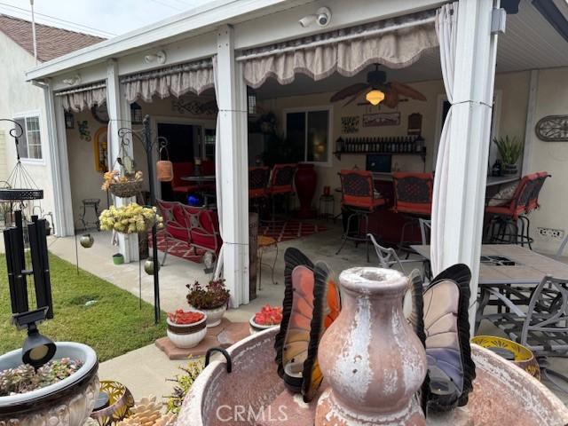 9912 Muroc St, Bellflower, CA 90706 - view of patio / terrace with a ceiling fan