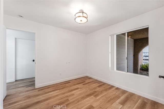 5453 Softwind Way, Agoura Hills, CA 91301 - unfurnished room with light wood finished floors and baseboards