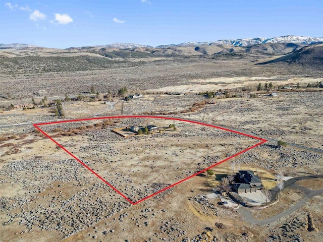 604 River Ranch Rd, Markleeville, CA 96120 - aerial view of property and surrounding area featuring property parcel outlined, mountains, a desert landscape, and rural landscape