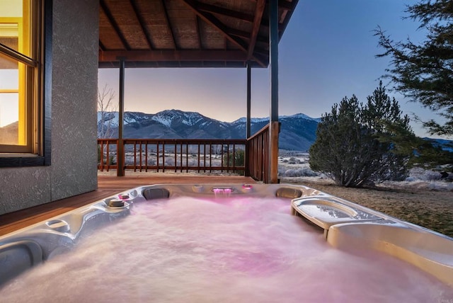 604 River Ranch Rd, Markleeville, CA 96120 - view of patio / terrace with a deck with mountain view and an outdoor hot tub