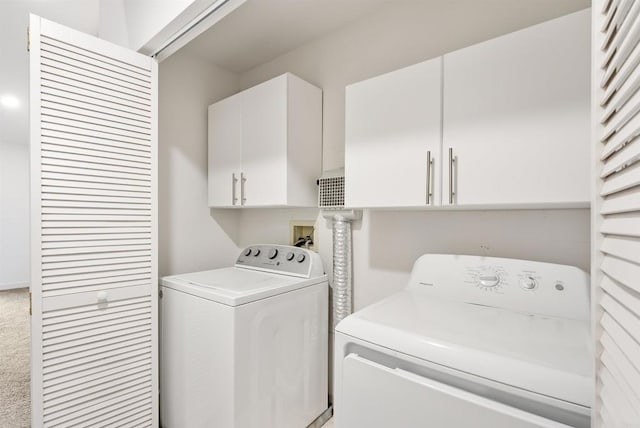 604 River Ranch Rd, Markleeville, CA 96120 - laundry area with washing machine and clothes dryer, cabinet space, and light colored carpet
