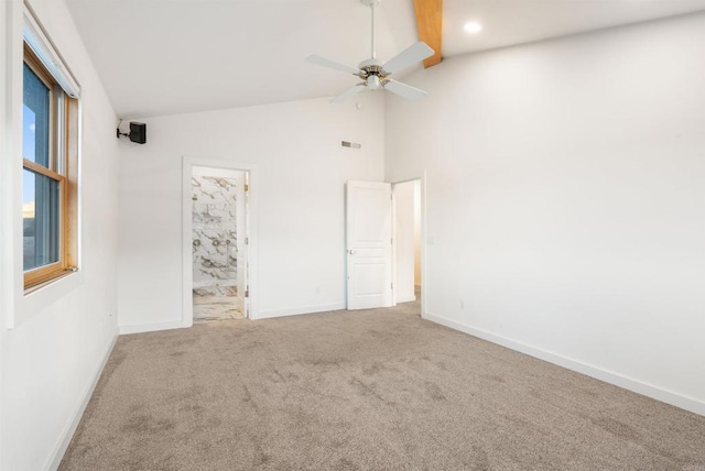 604 River Ranch Rd, Markleeville, CA 96120 - unfurnished bedroom featuring carpet floors, baseboards, beamed ceiling, connected bathroom, and a ceiling fan