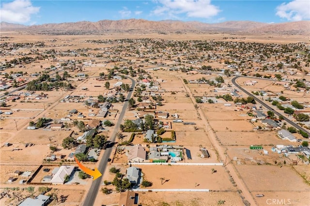 14317 Jicarilla Rd, Apple Valley, CA 92307 - aerial overview of property's location with mountains and a desert landscape