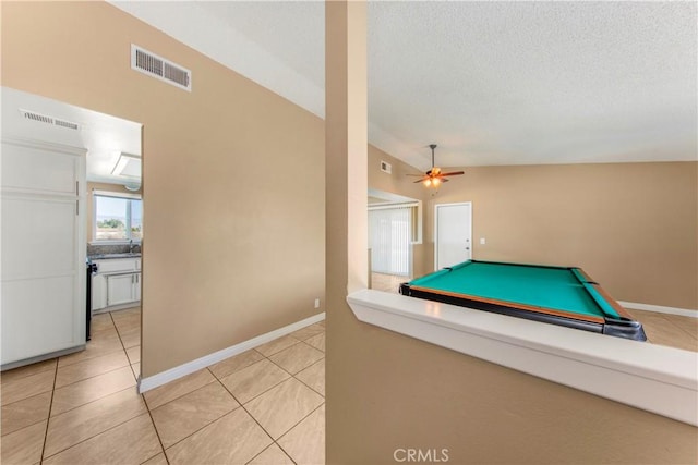 14317 Jicarilla Rd, Apple Valley, CA 92307 - game room featuring light tile patterned floors, a ceiling fan, baseboards, billiards table, and a textured ceiling