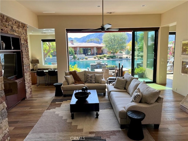 50135 Camino Privado Ln, Quinta, CA 92253 - living room with wood finished floors, a ceiling fan, and recessed lighting